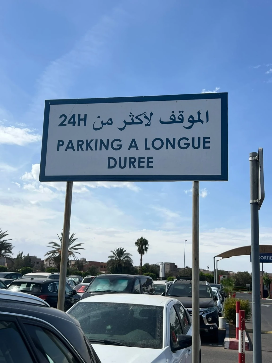 Long-stay parking sign at Marrakech Menara Airport